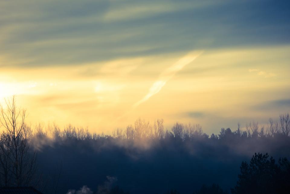 Sunrise over open fields